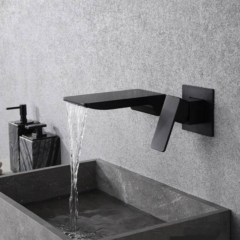 Wall-mounted faucet installed in a contemporary bathroom