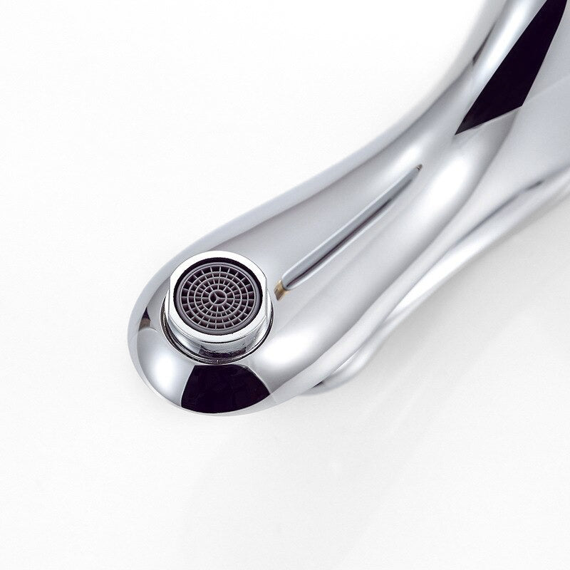 Modern Chrome Basin Faucet with Sculpted Handle - Image 2