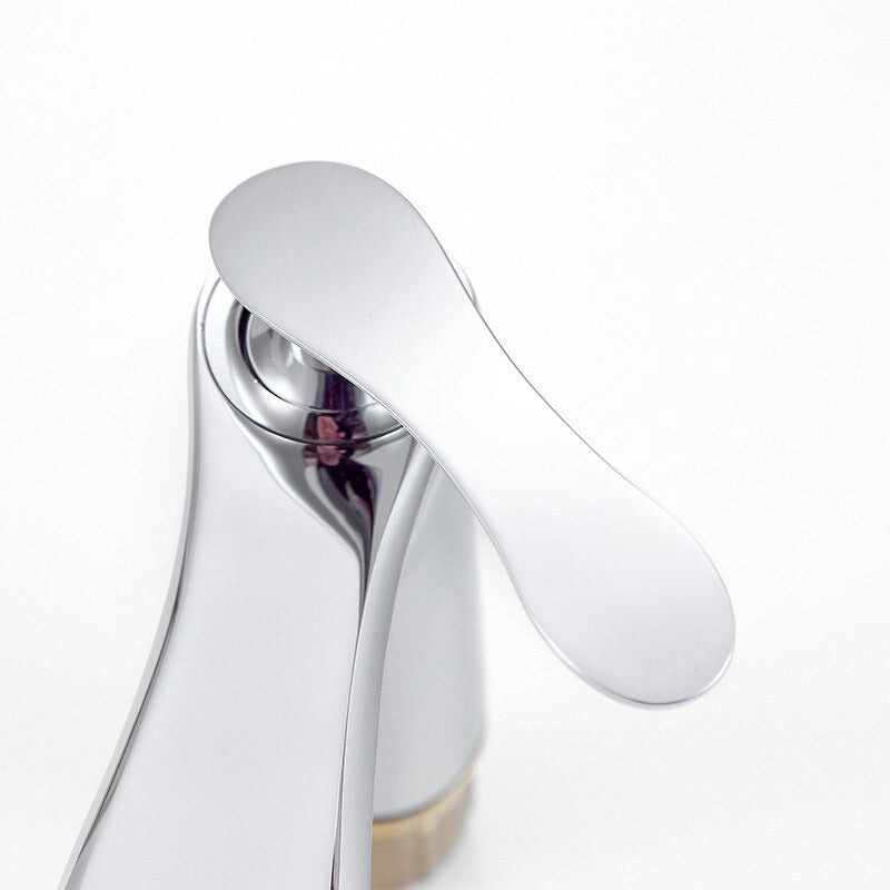 Modern Chrome Basin Faucet with Sculpted Handle - Image 3