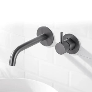 Metallic grey wall-mounted tap, overview with knurled pattern